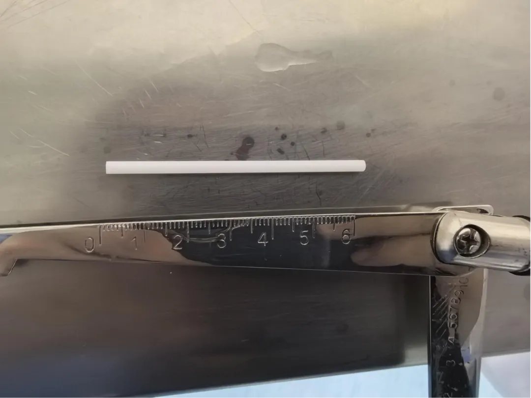 The 6 cm plastic lollipop stick removed from the toddler's stomach