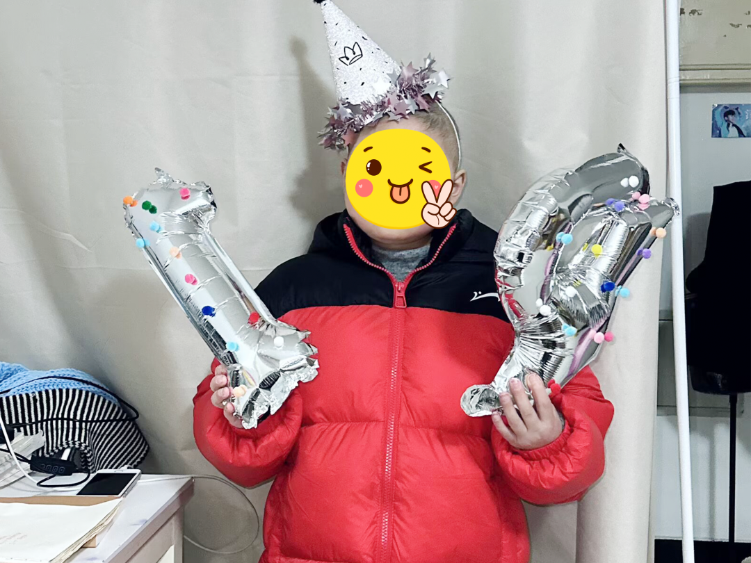Mingming celebrates a birthday with balloons during his recovery